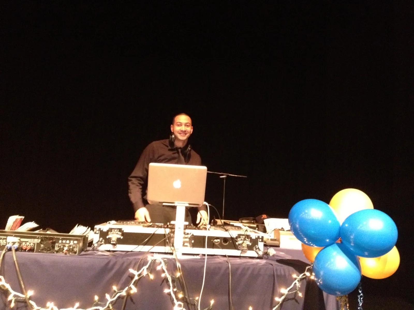 DJ on stage at a school dance